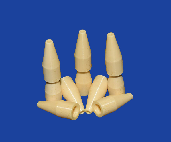 Microporous ceramic nozzles